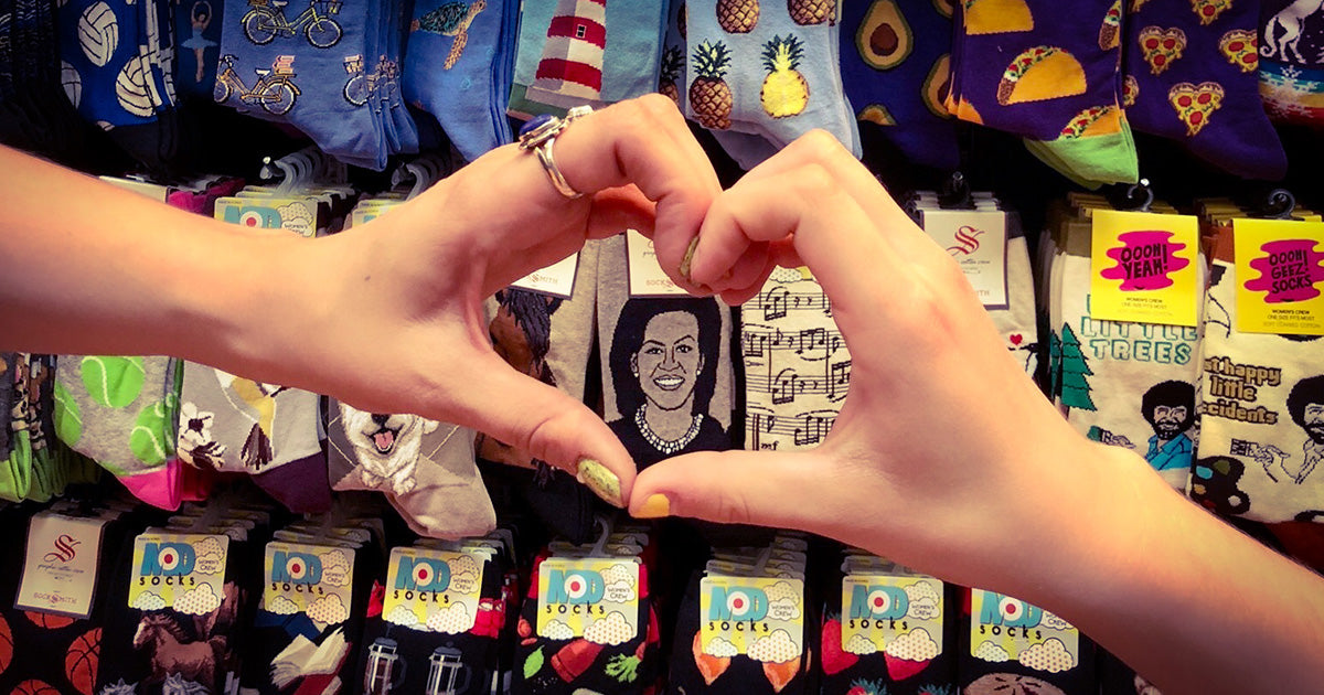 Happy heart hands with Michelle Obama socks inside