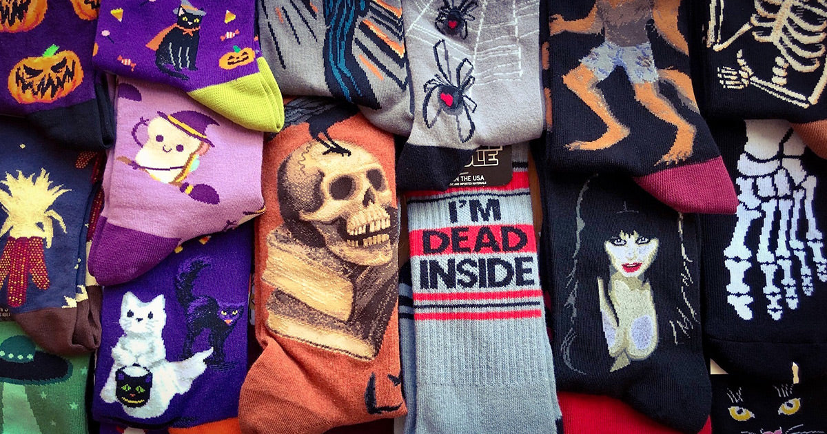 Halloween socks including jack-o-lanterns, witches, cats, ghosts and skeletons.