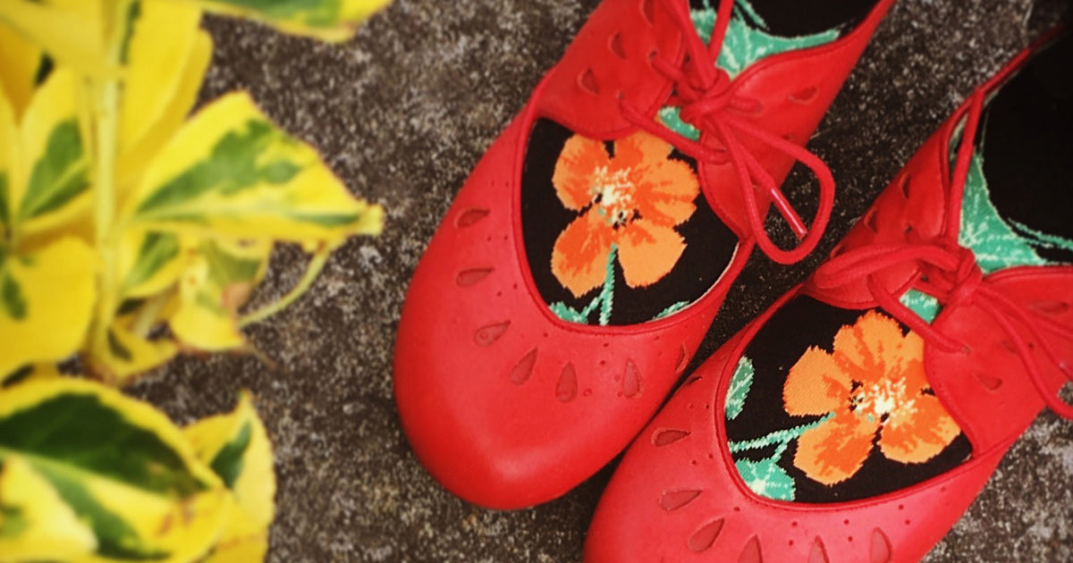 Floral knee-high socks with nasturtium flowers.