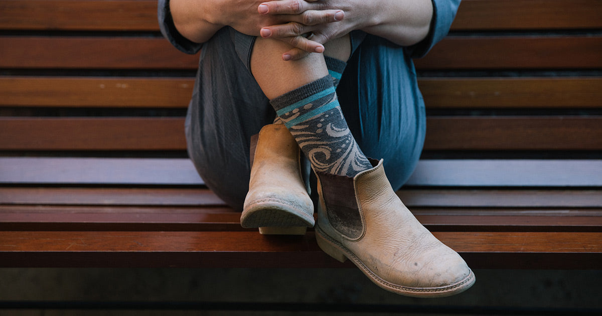 Wear cute crew socks with low-cut Chelsea boots