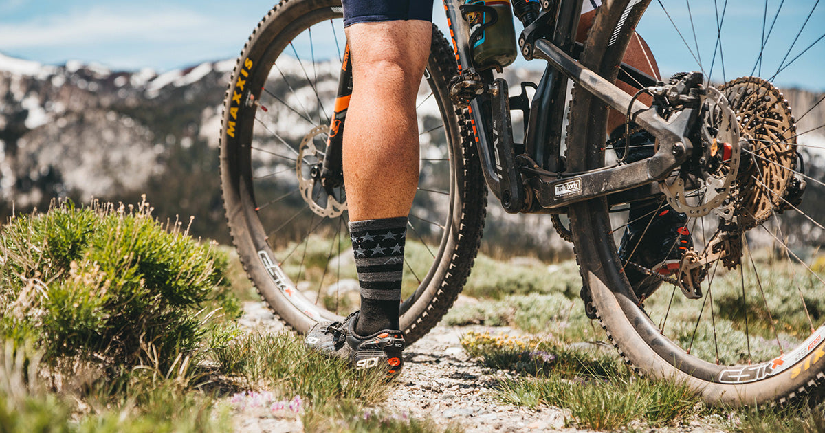 Socks for cycling featuring a pattern of stars and stripes