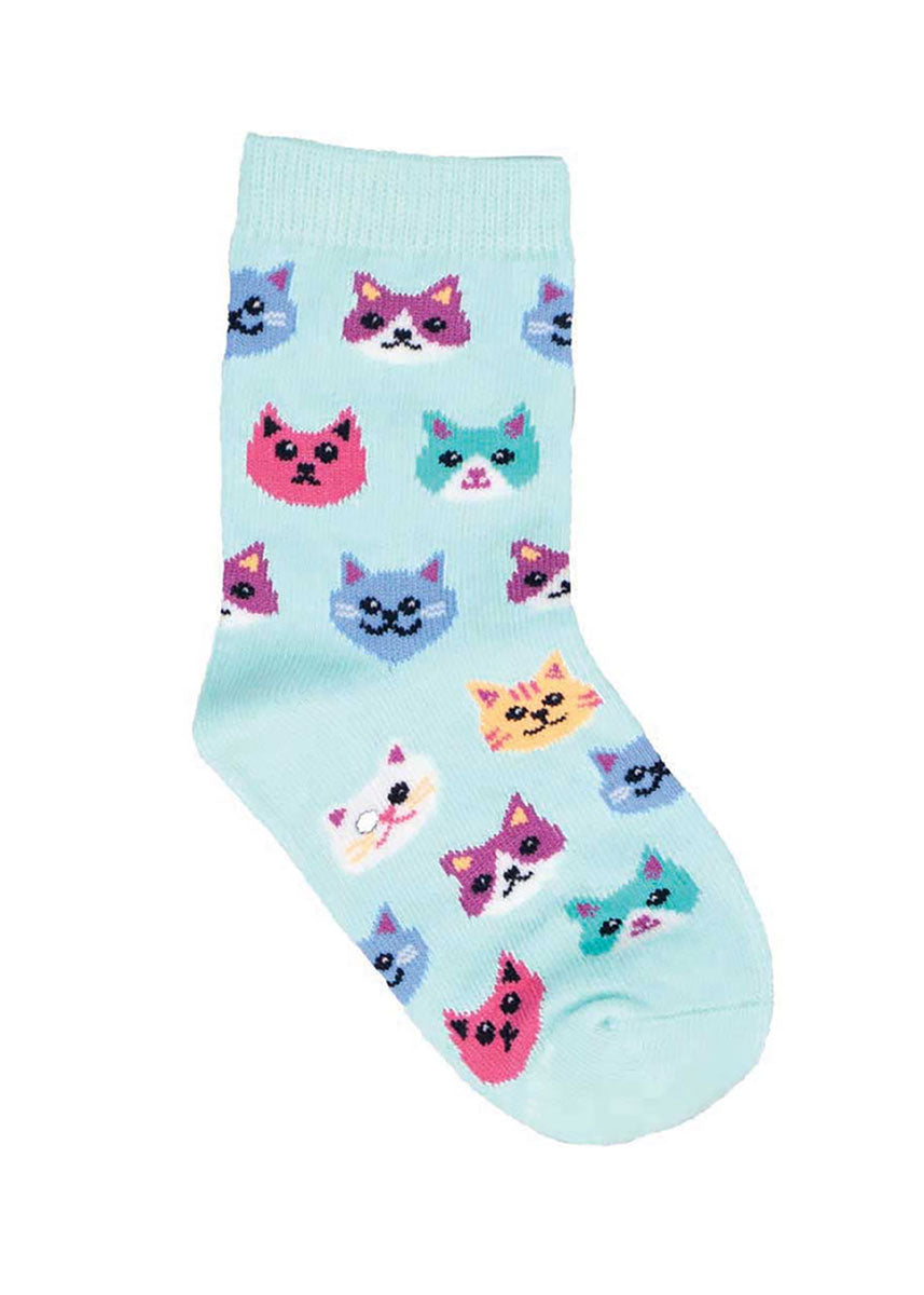 Light blue crew socks for kids with an allover pattern of colorful cat faces. 
