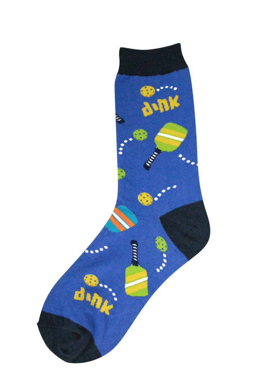 Blue novelty crew socks for women featuring a colorful allover pattern of pickleballs, paddles, and the word "dink."