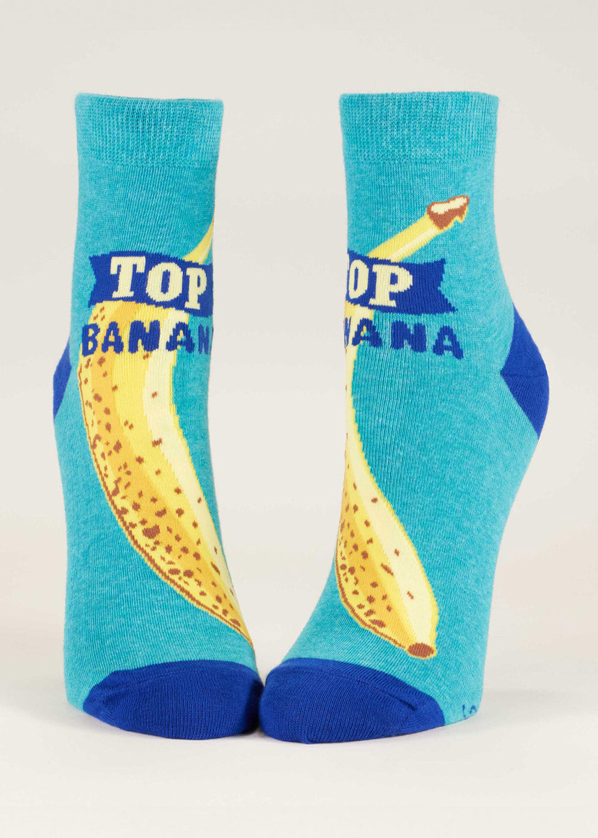 Blue ankle socks for women that say "Top Banana" and feature a large yellow banana on each sock.
