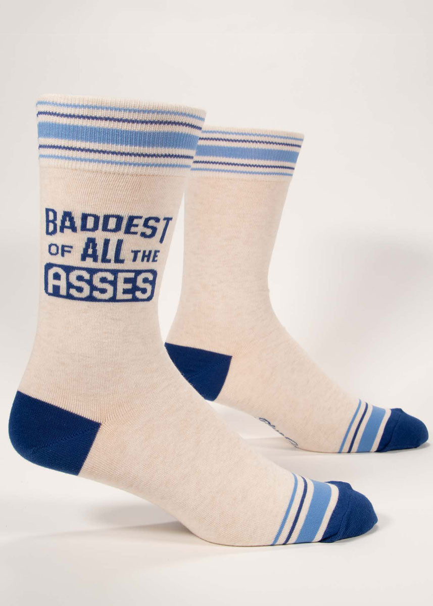 Ivory heather men's crew socks with blue accents say “Baddest of All the Asses” on the leg.
