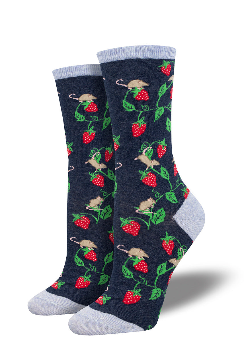 Women&#39;s crew socks featuring a repeating pattern of mice climbing on strawberries over a heather navy background with lighter blue accents at the heel, toe and cuff.