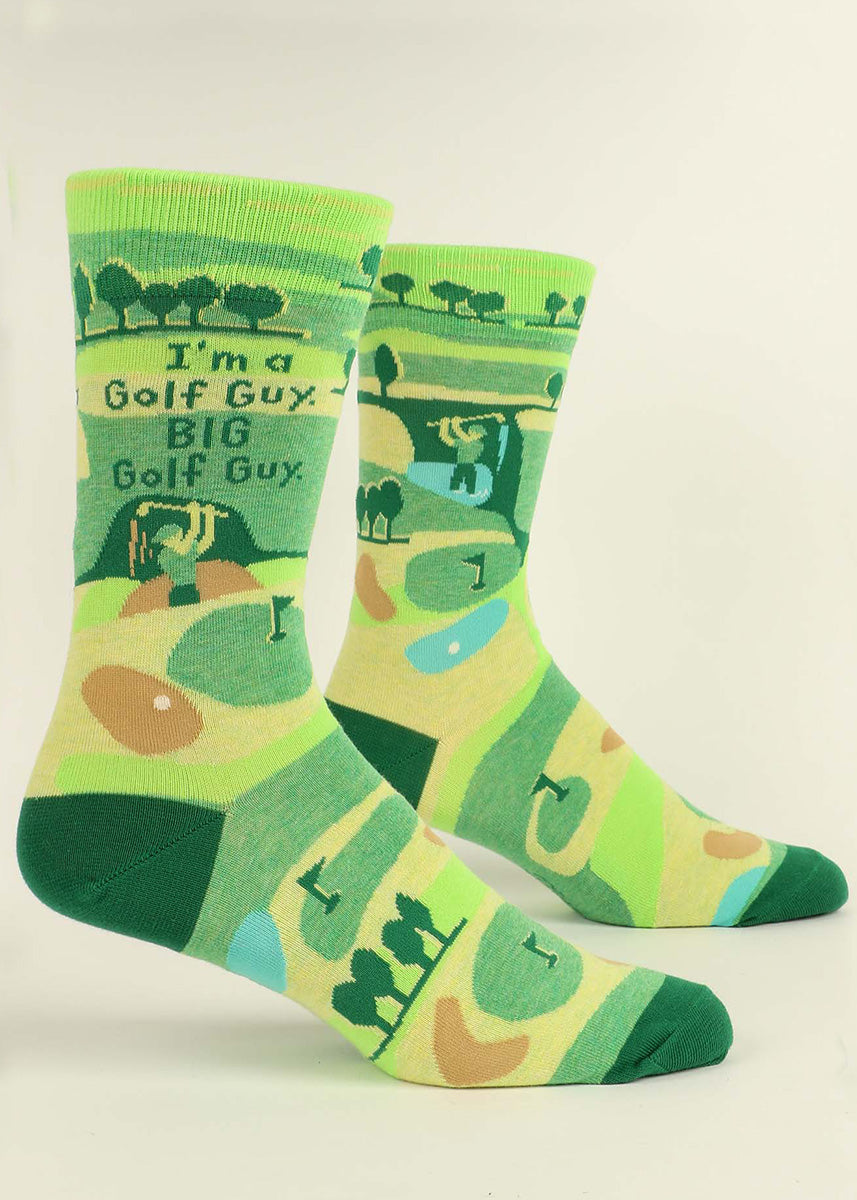 Funny golf socks for men show a hapless golfer hitting the course with the words, &quot;I&#39;m a golf guy. BIG golf guy.&quot;