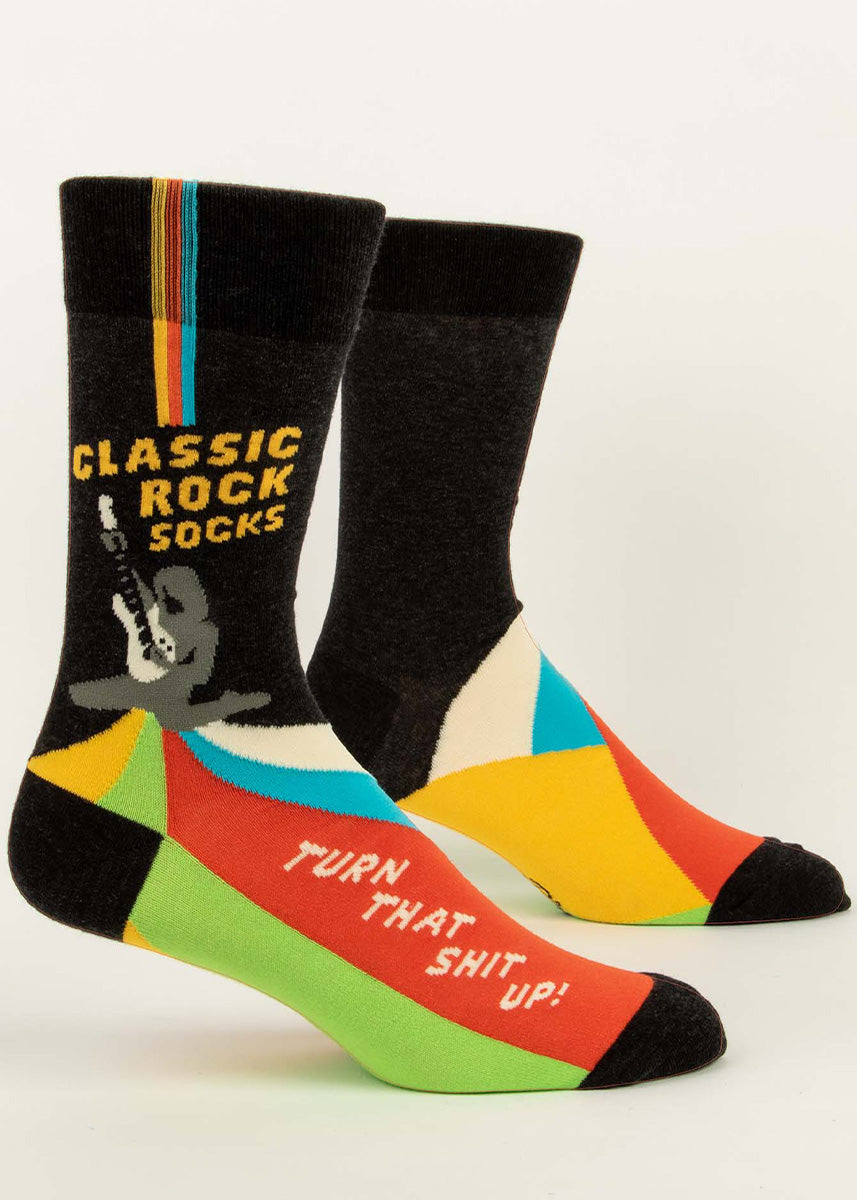 Funny music socks for men show someone rocking out on a guitar with the words, "Classic Rock Socks," and "Turn that shit up!"