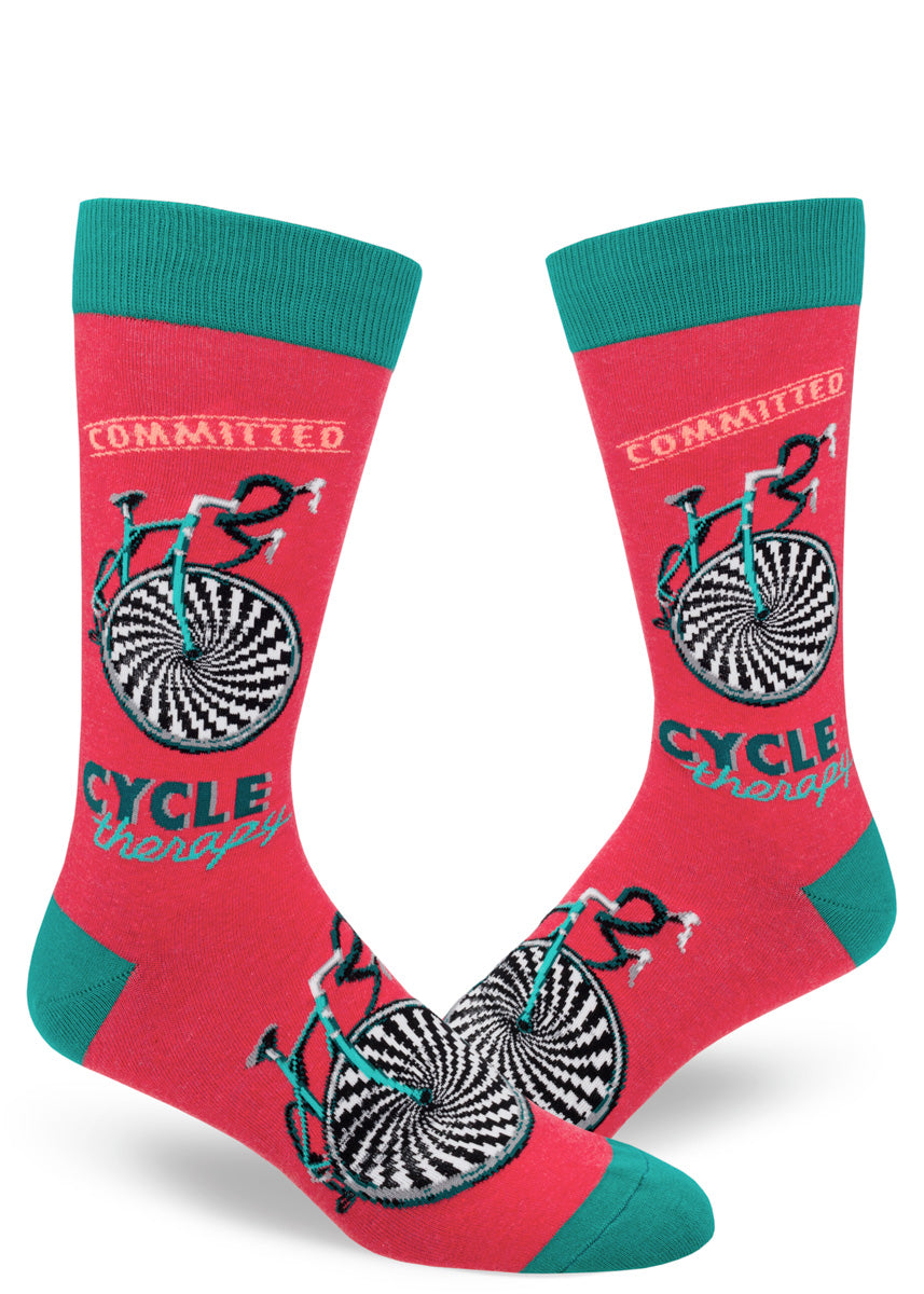 Bicycle socks for men with the words &quot;Cycle Therapy&quot; and &quot;Commited&quot; on a red background