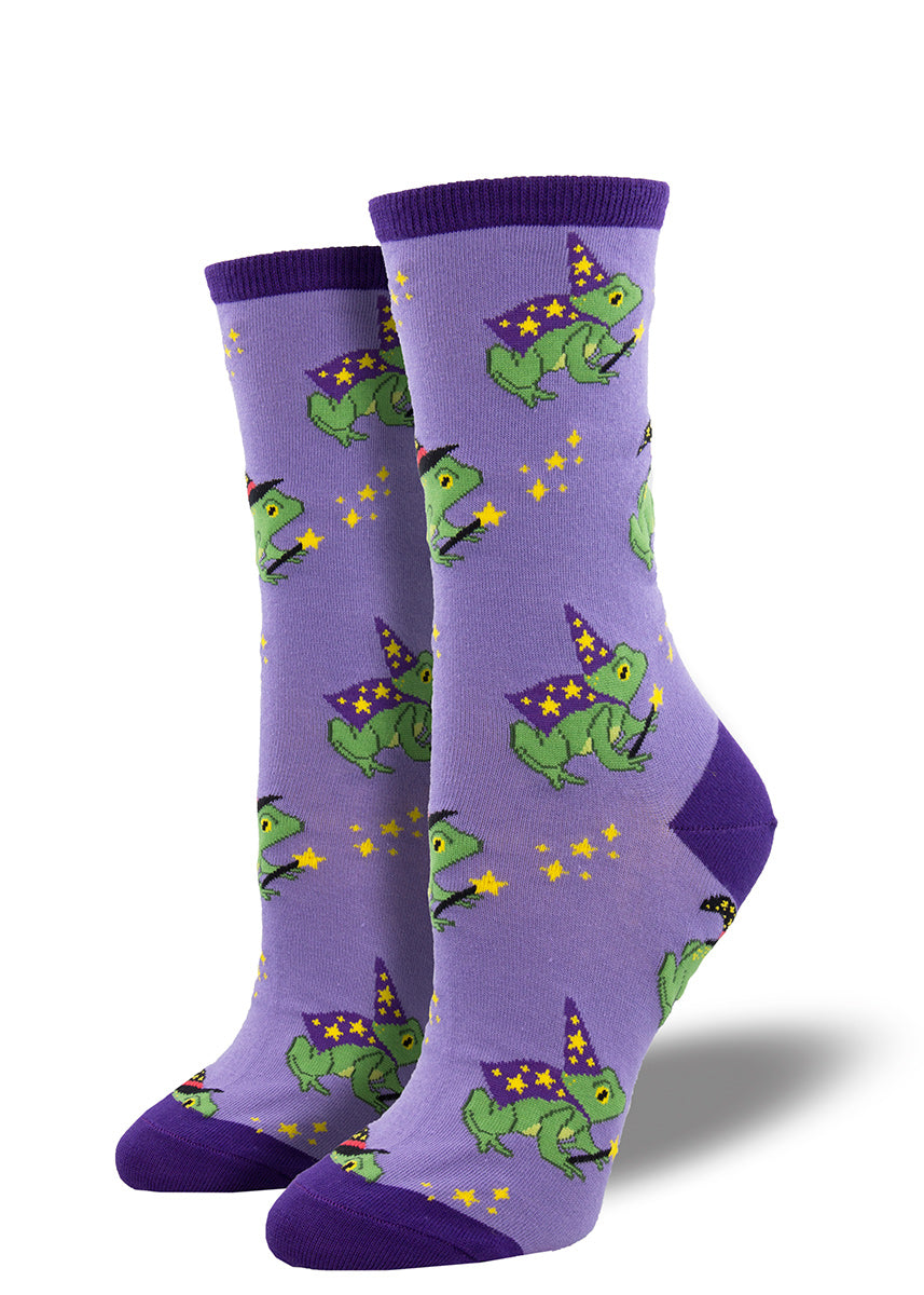 Funny frog socks for women show frogs wearing capes and witch and wizard hats and pointing their magic star wands. 