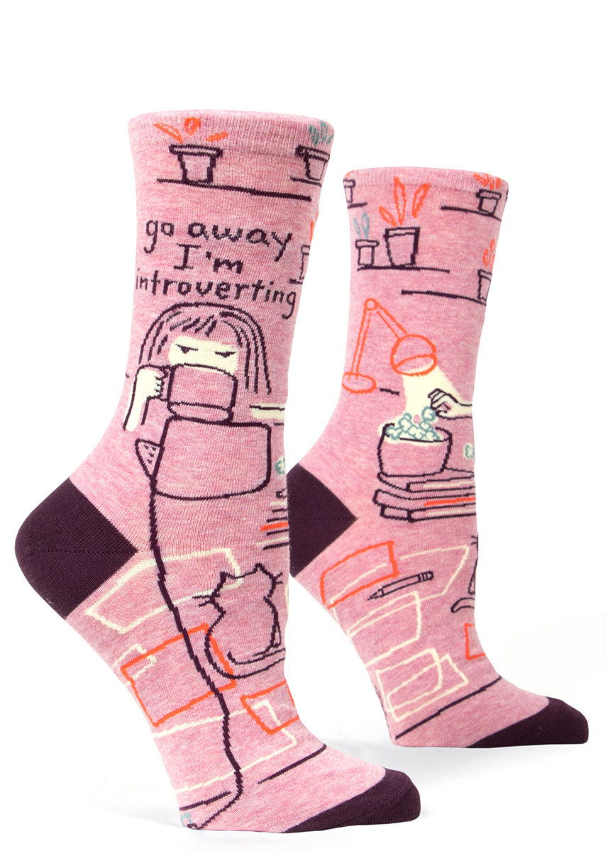 Funny women's socks that say "Go away I'm introverting" with a cat and coffee.