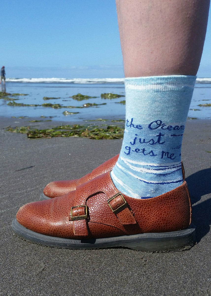 Ocean socks for women say &quot;the ocean just gets me&quot; over a sweet beach scene!