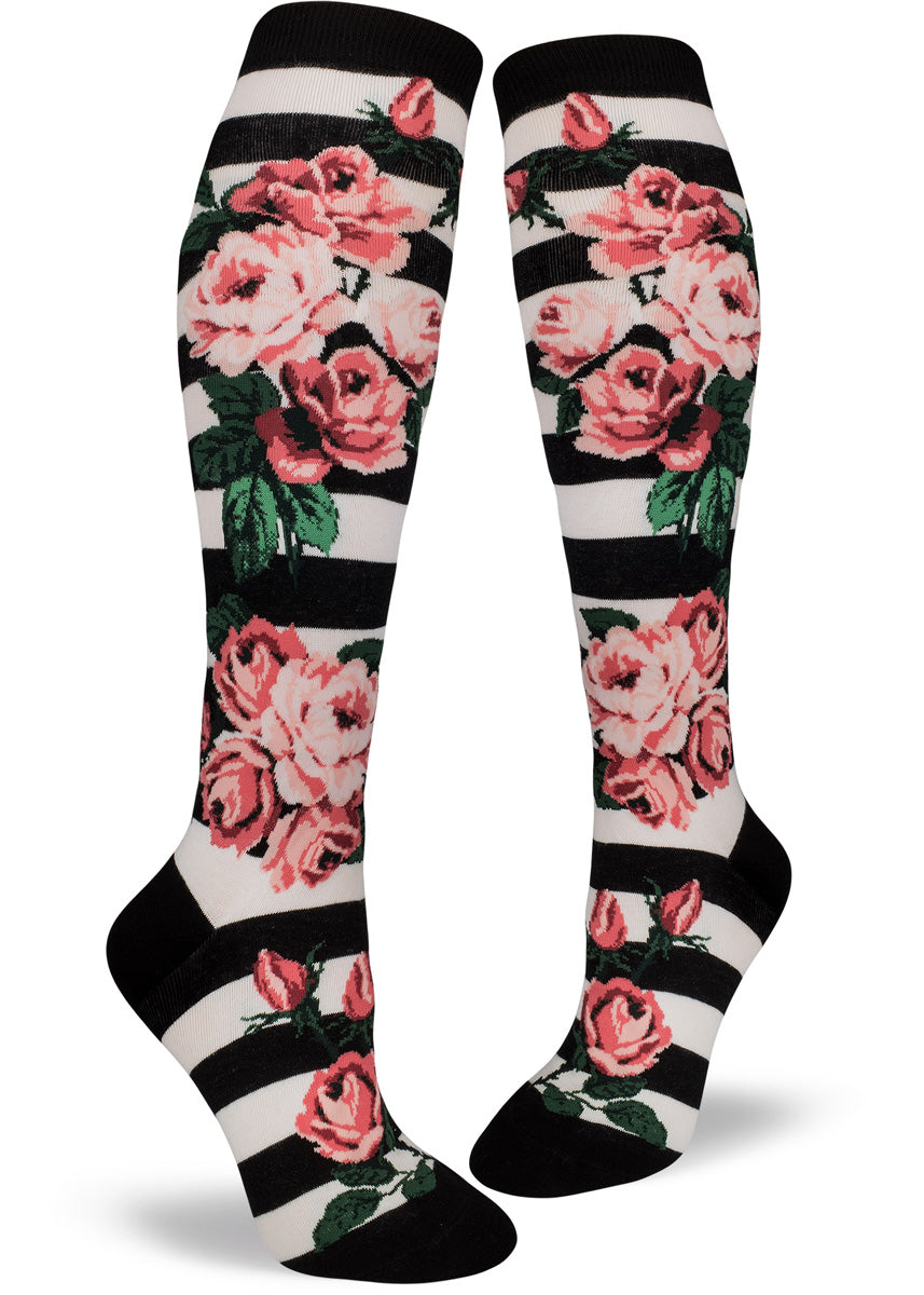 Rose socks for women with pretty pink roses on a black & white striped background.