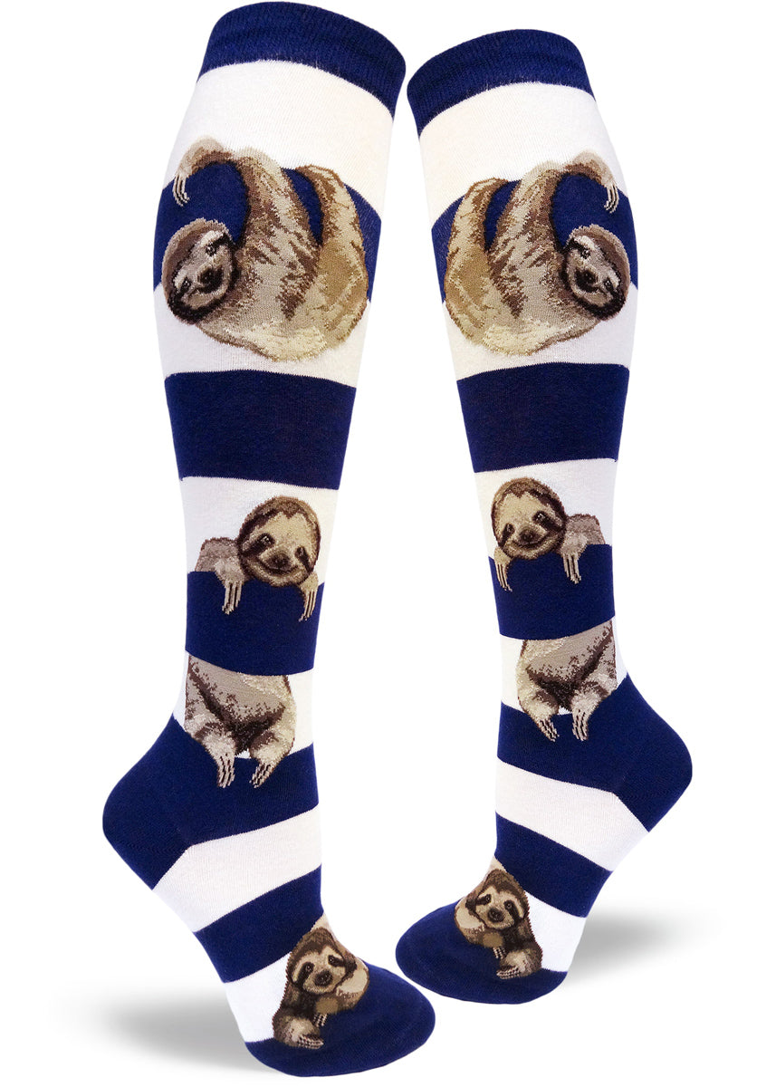 Cute knee-high sloth socks for women with sloths hanging between navy and white stripes