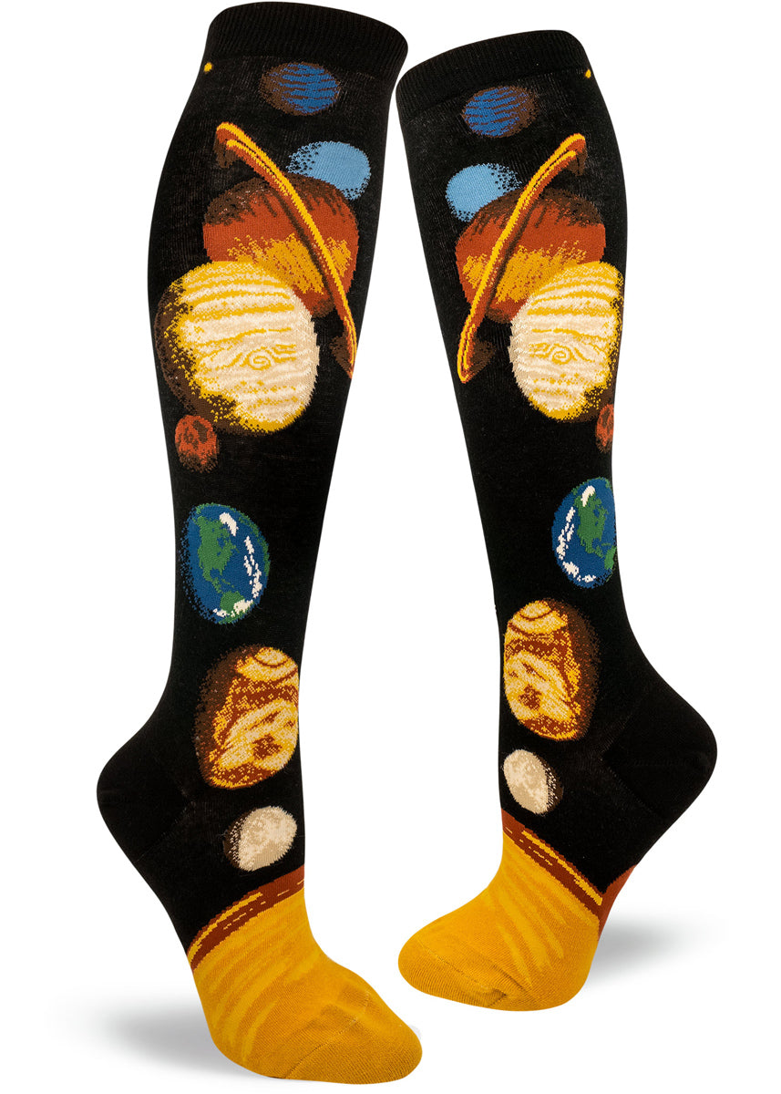 Solar system socks for women with the planets, moon &amp; sun going along the knee-high with a black background