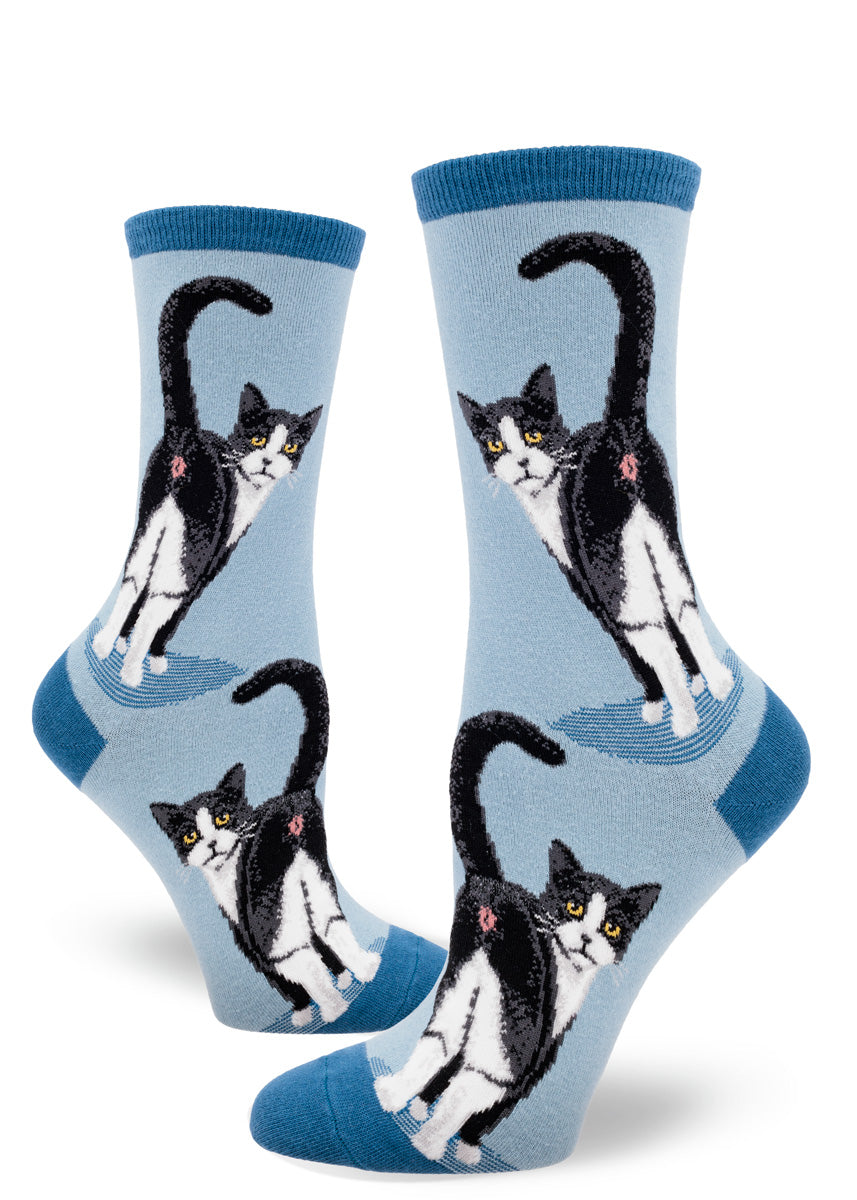 Slate blue women&#39;s crew socks with a design of tuxedo cats inviting you to peek at their butts.