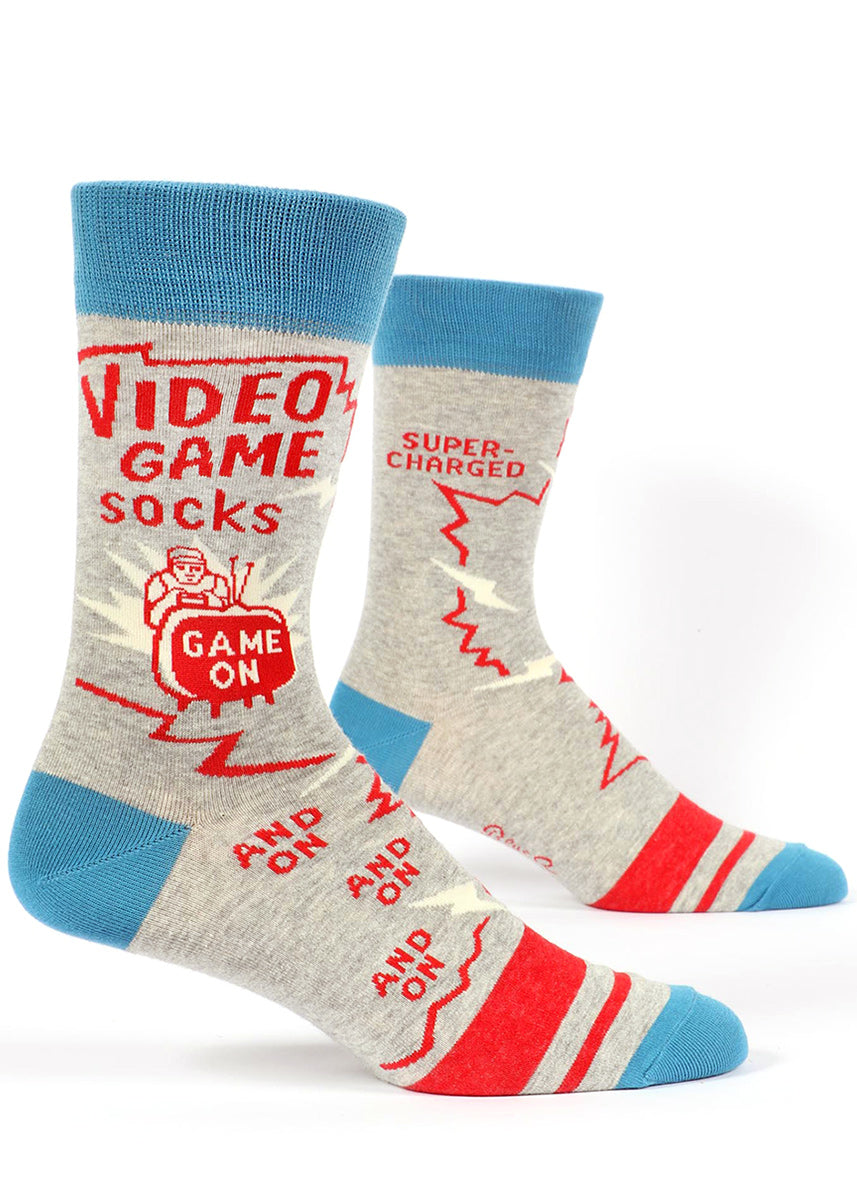 Video game socks for men that say &quot;Video Game Socks&quot; and &quot;Game on&quot; with a gamer in front of a television