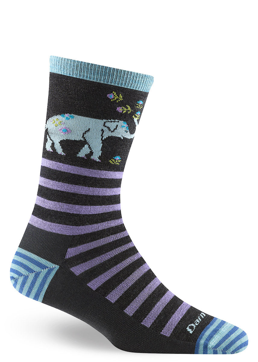 An elephant tosses flowers into the air on these purple and charcoal striped wool crew socks with blue accents at the heel, toe and cuff.