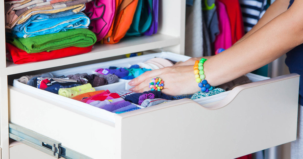 Sock drawer full of colorful novelty socks.