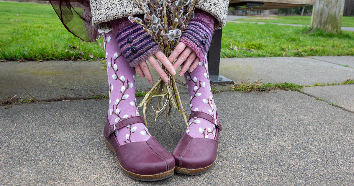 Pussy willow socks with a purple background perfect for spring.