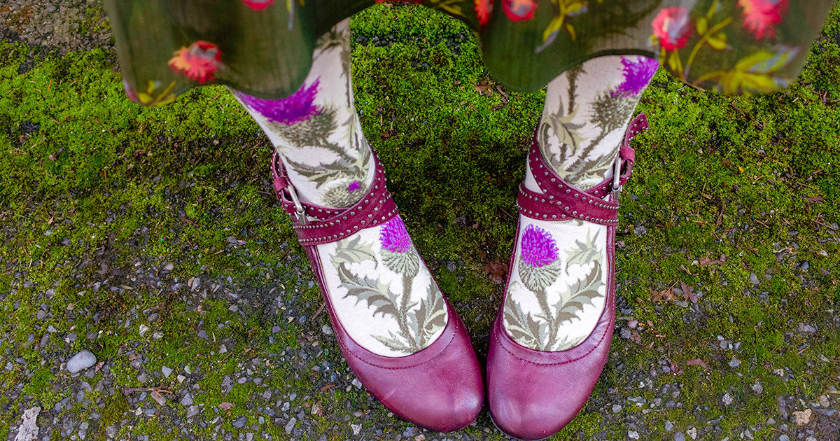 Thistle socks for women with purple flowers and green leaves