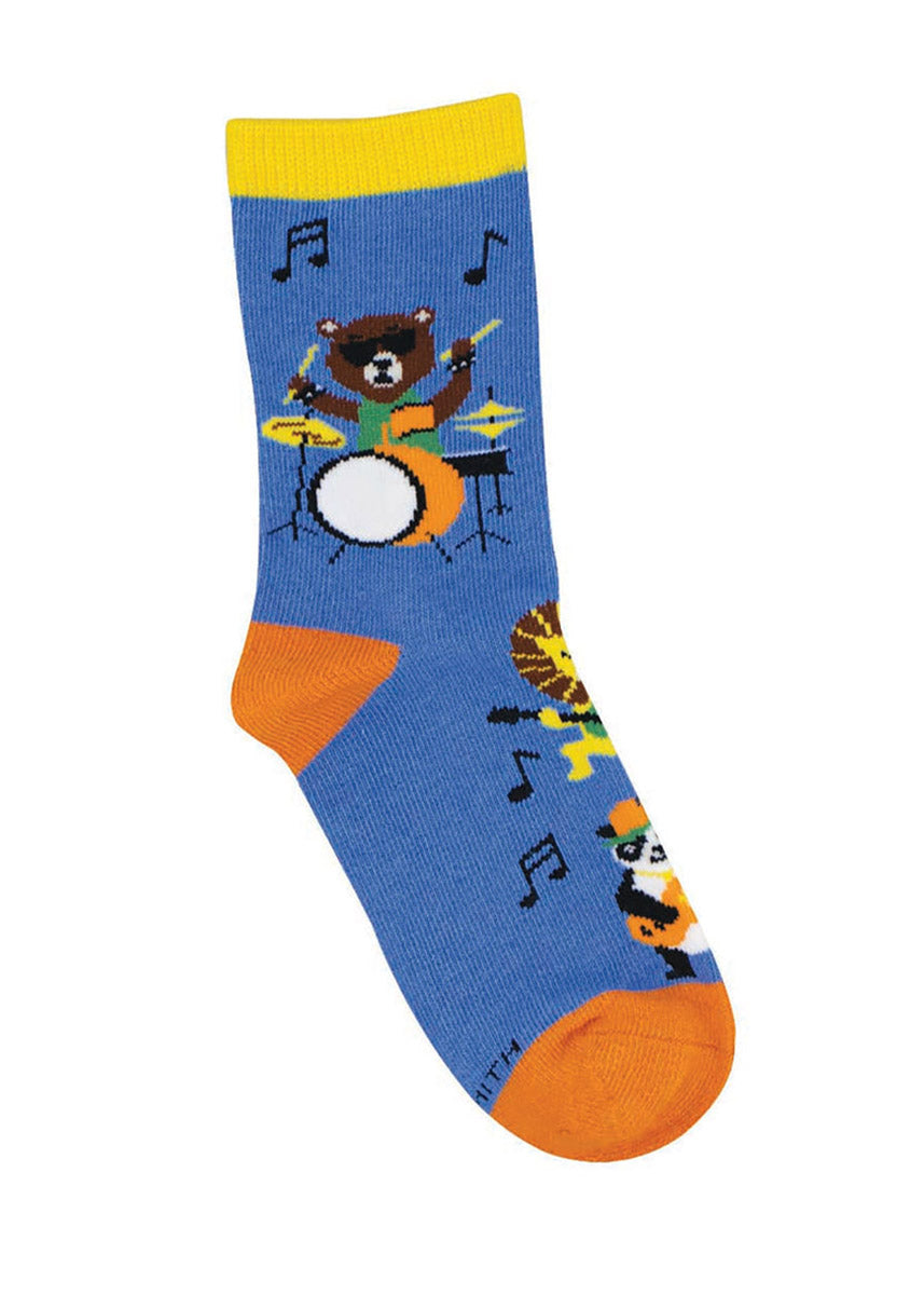 Blue crew socks for kids with yellow and orange accents feature a brown bear, lion, and panda bear each playing a musical instrument. 