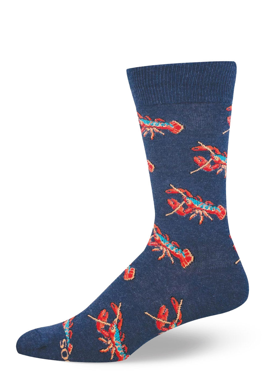 Navy blue men's crew sock with red lobster pattern on a white background.
