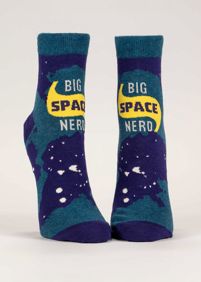 Navy and dark teal novelty ankle socks for women that say &quot;Big Space Nerd&quot; against an abstract celestial pattern.