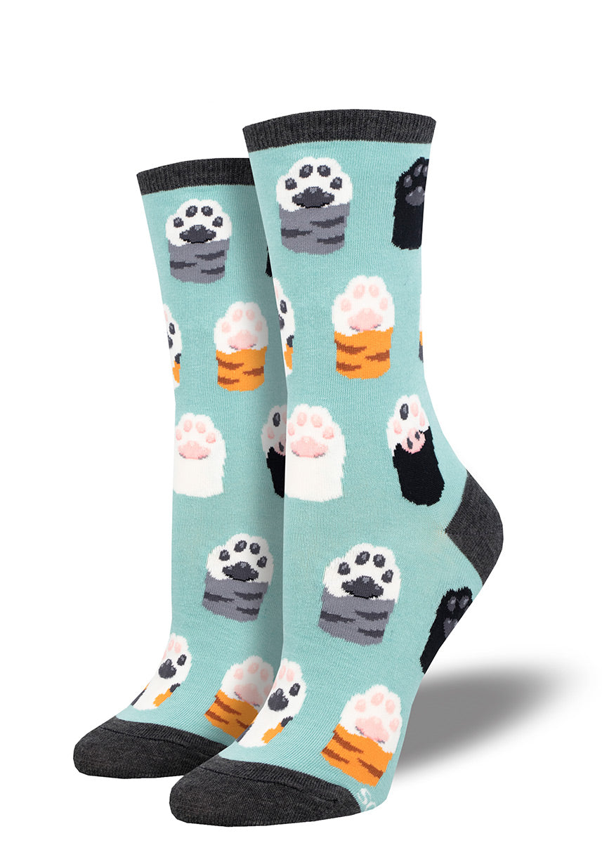 Aqua women's crew socks with a repeating pattern of raised cat paws with different fur colors represented including tabby, black and white.