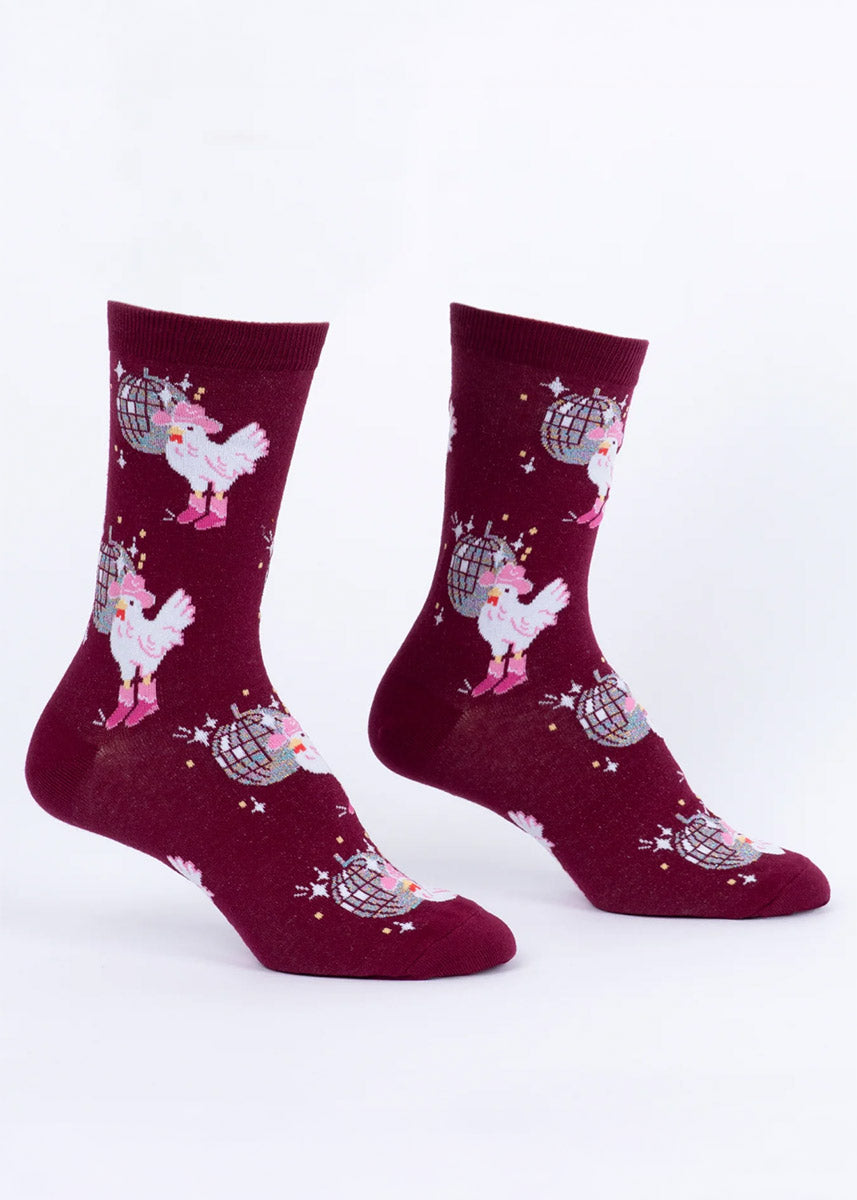 Maroon crew socks with a disco-dancing chicken design on a white background.