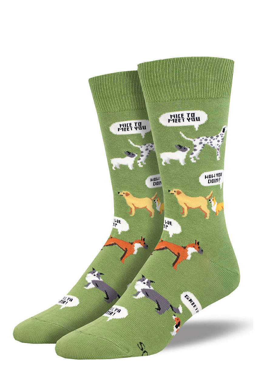 Green men's crew socks with an allover pattern of different dog breeds sniffing each other's butts.