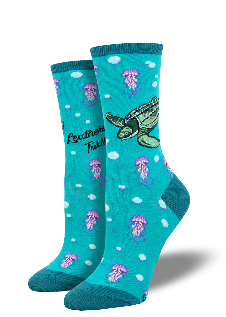 Teal crew socks for women with a design of turtles, jellyfish and underwater bubbles.