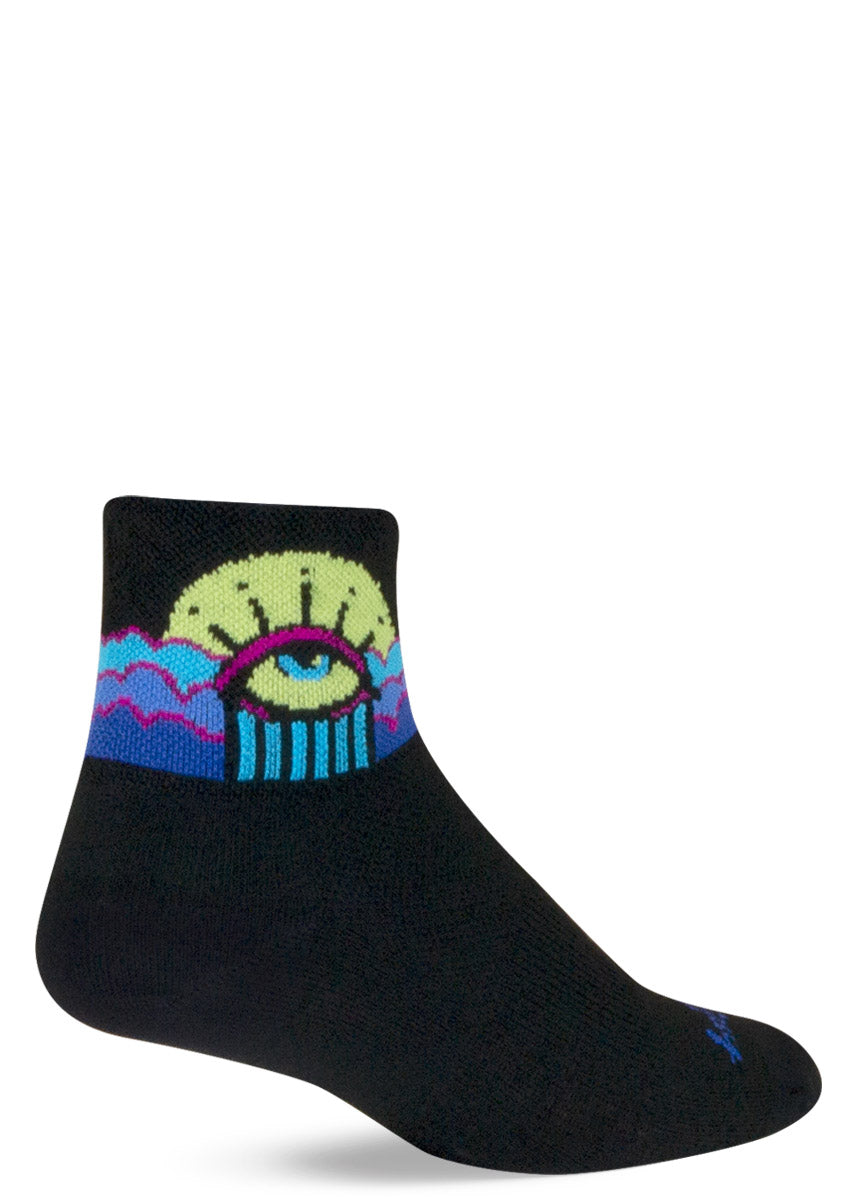 Black athletic ankle socks for women that feature a mystical yellow, blue, and pink eye design at the cuff.