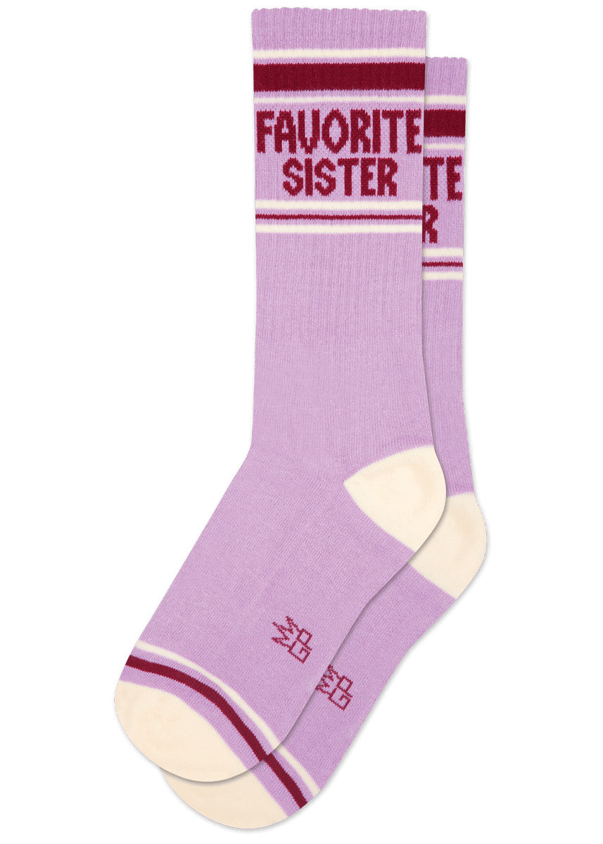 Light purple retro-striped athletic socks with burgundy and cream accents and 'FAVORITE SISTER' text at the cuff.