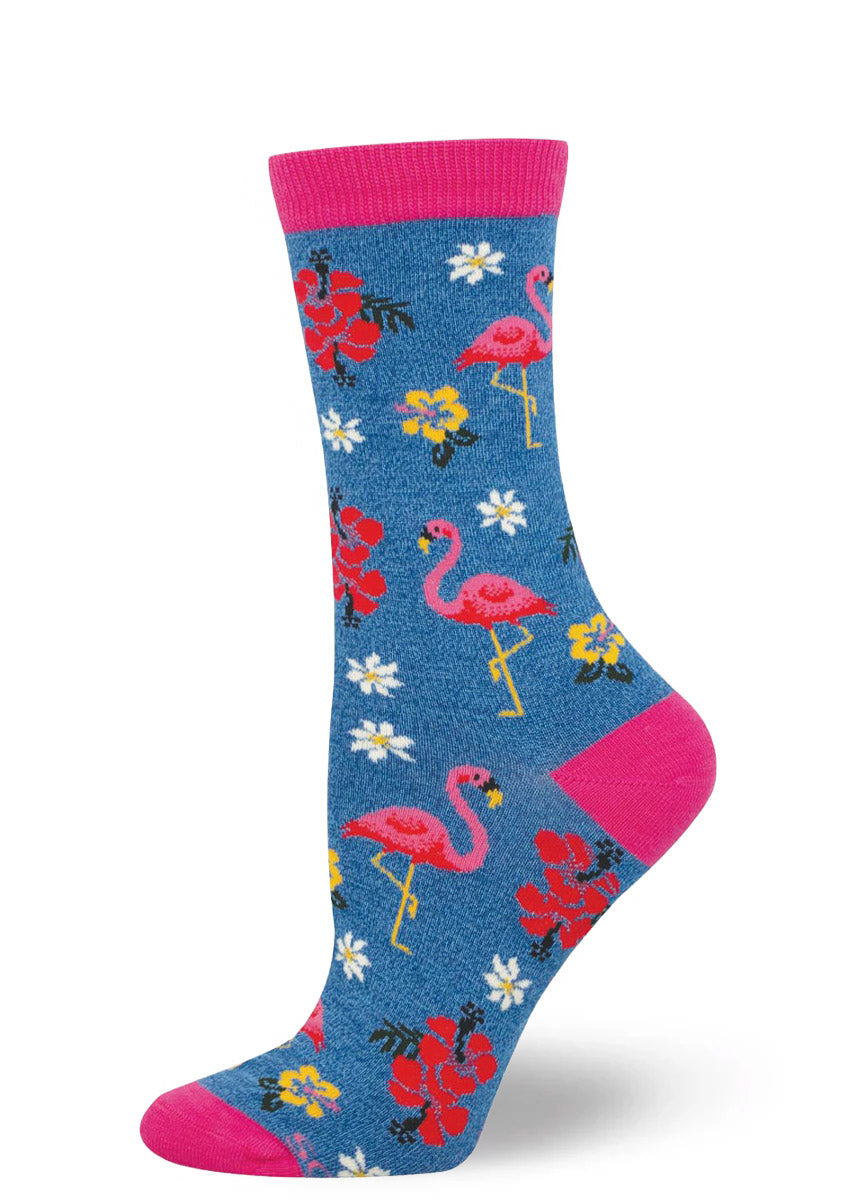Blue women's crew sock with pink flamingo design and floral accents on a white background.
