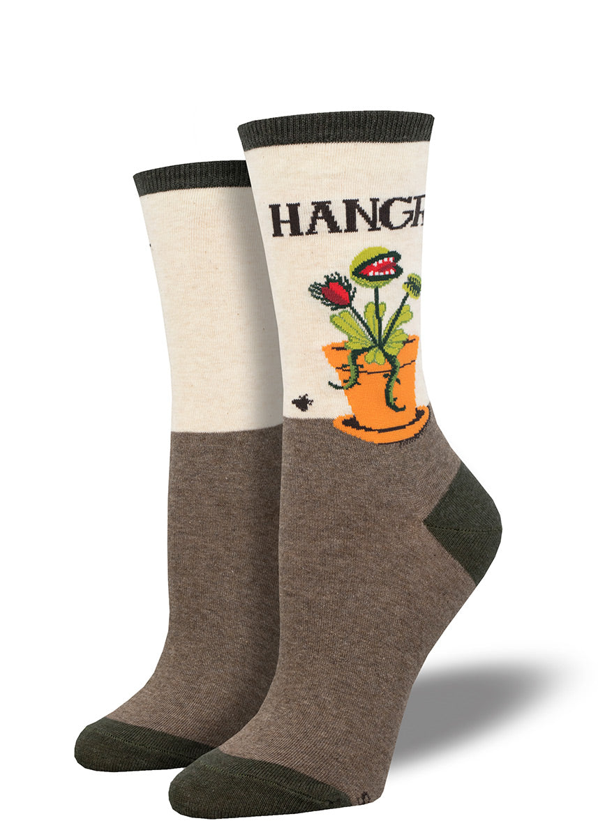 Women's crew socks say "HANGRY" and show a toothy Venus fly trap plant over a brown and cream background.