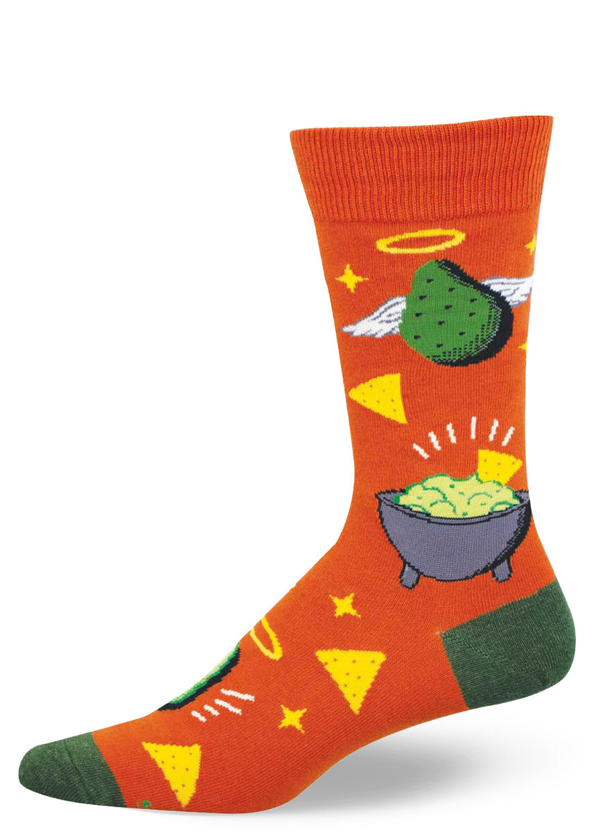 Orange sock with avocado angels, guacamole and tortilla chip designs on a white background.