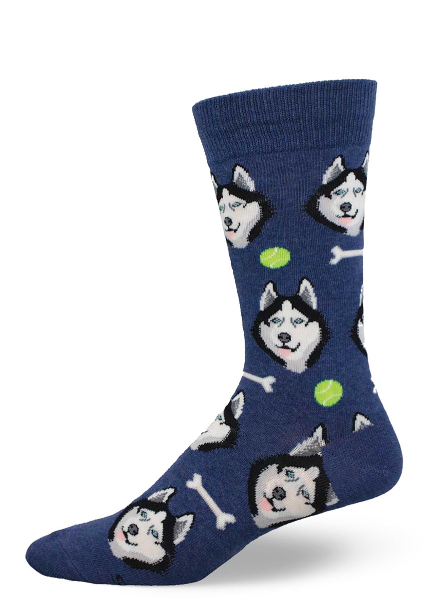 Navy crew socks for men with an allover pattern of husky dog faces, bones, and tennis balls. 