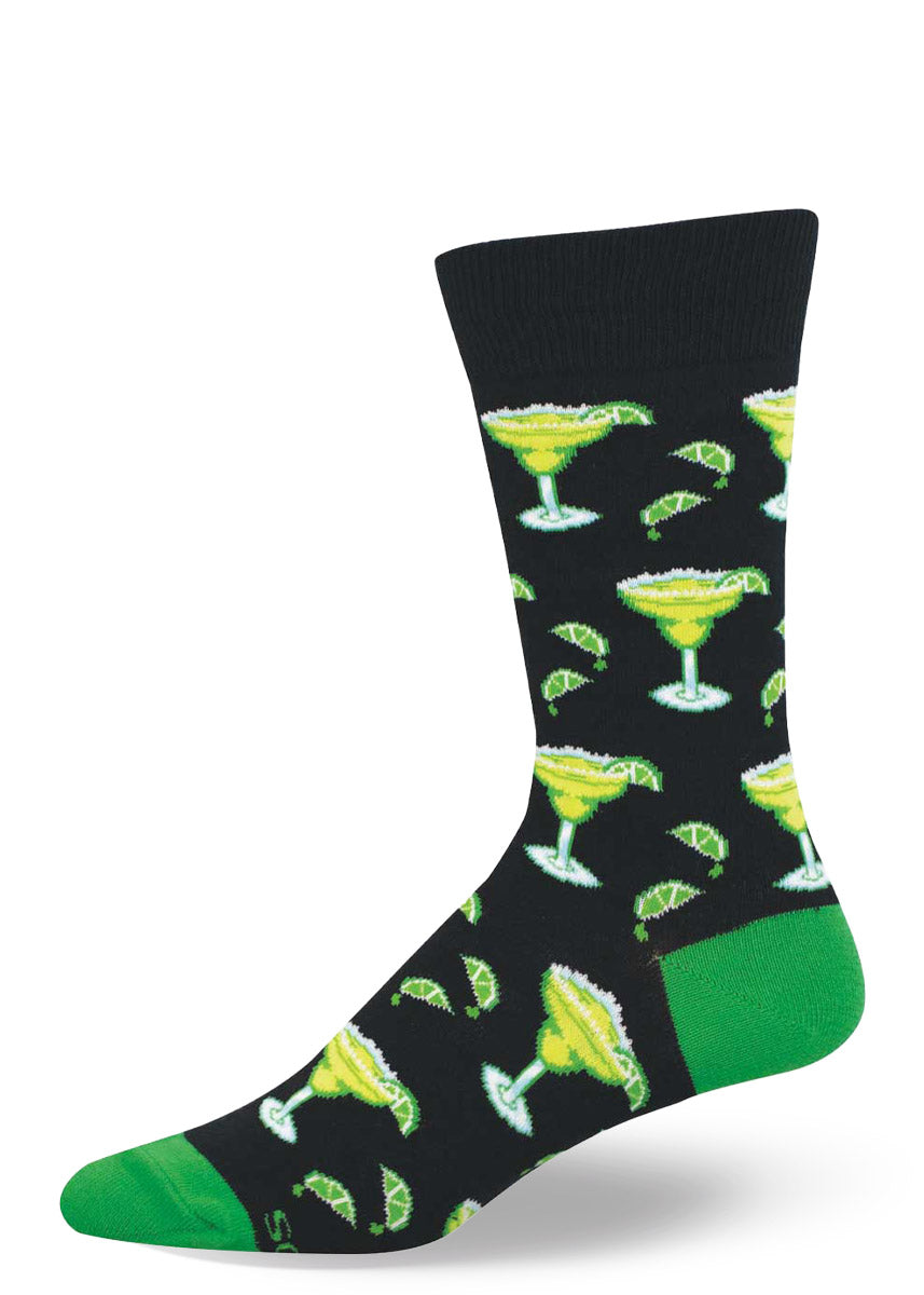 Men's crew sock with allover margarita pattern on a black background with green accents.