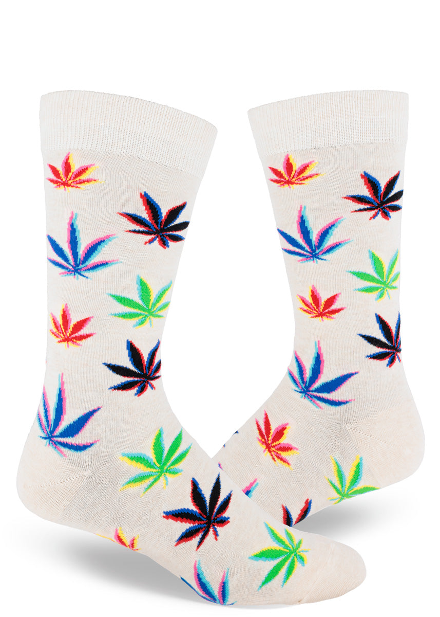 Men&#39;s crew socks feature colorful pot leaves with an artistic glitch effect against a heather cream background.
