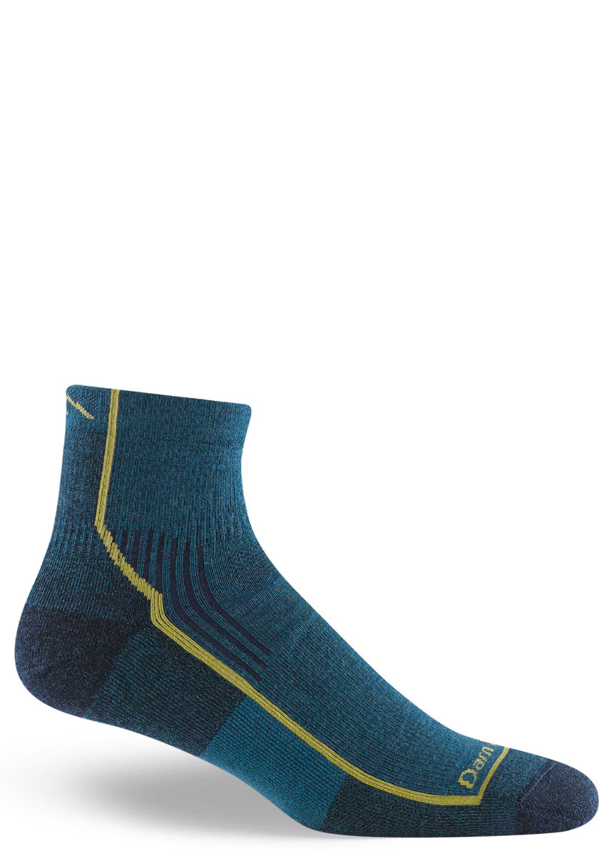 Low-rise wool hiking socks for men in dark teal with thin yellow stripe.