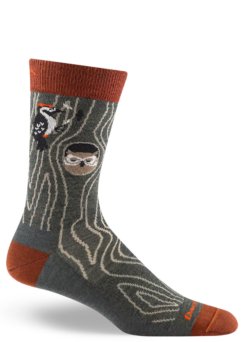 Taupe crew sock with an allover tree bark pattern, burnt orange accents and a bird-themed design.