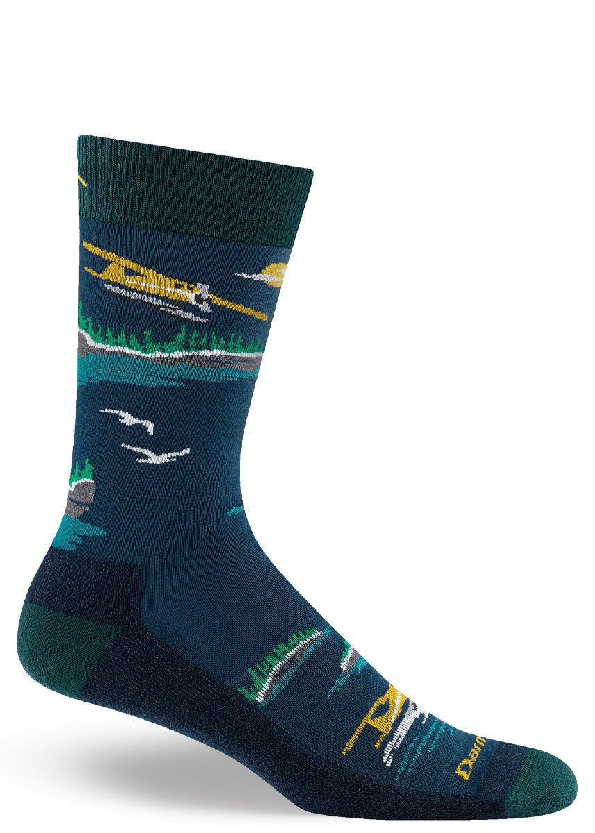 Men's crew socks with airplane and landscape design on a white background.