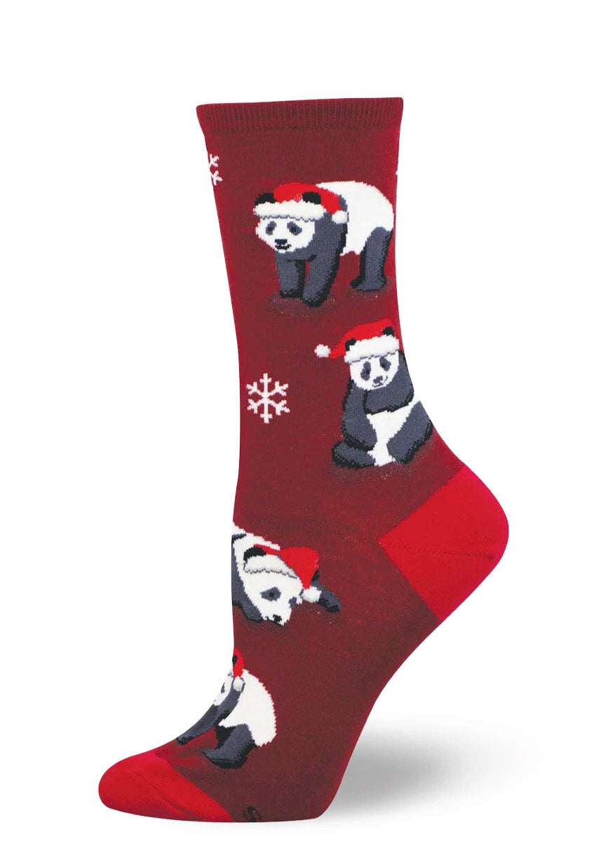 Christmas-themed burgundy women's crew sock with a design of panda bears wearing Santa hats.