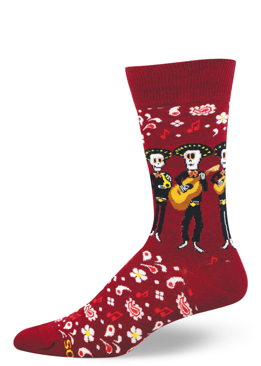 Red men's crew sock with mariachi skeleton design on a white background.
