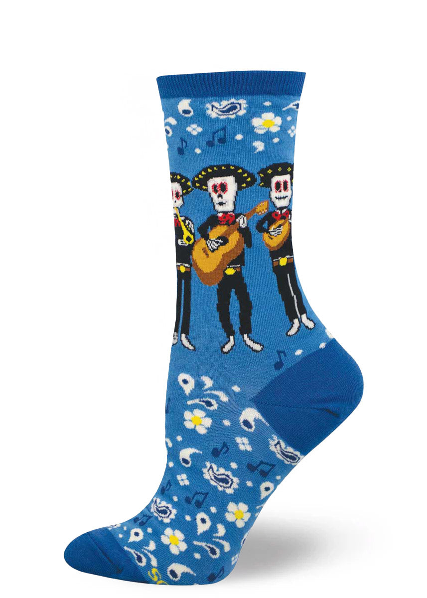 Blue women's crew sock with mariachi skeleton design on a white background.