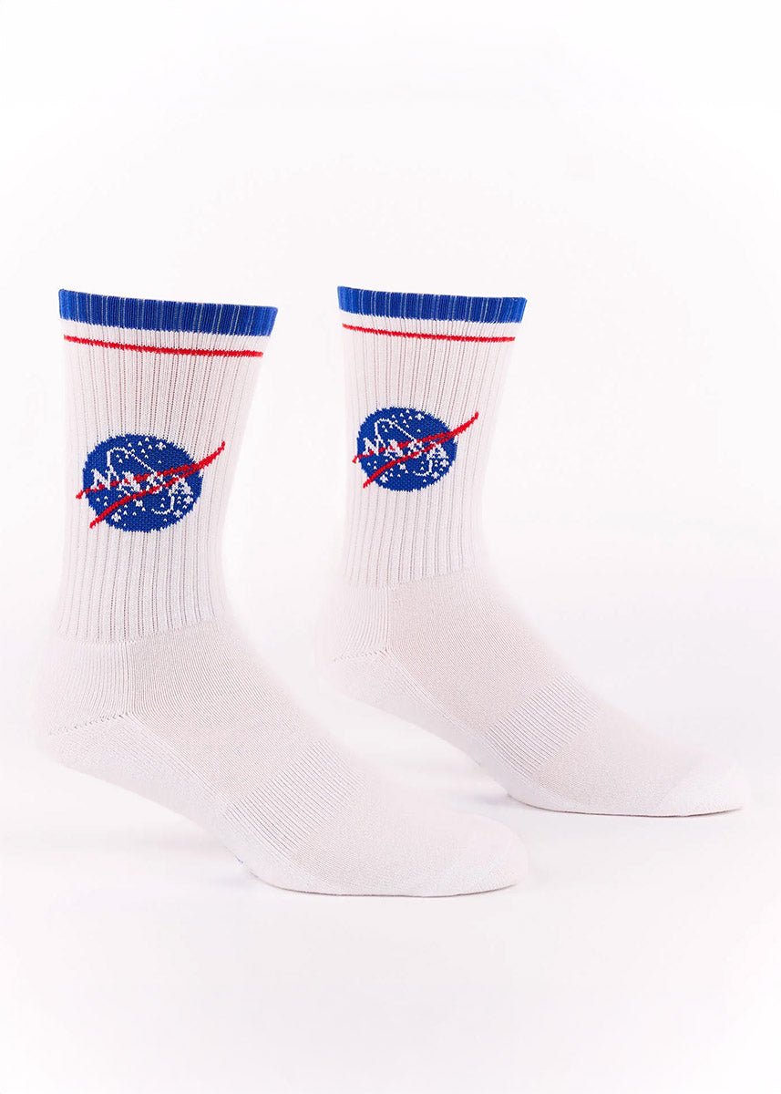 White ribbed athletic crew socks featuring the NASA logo and a blue and red striped cuff.