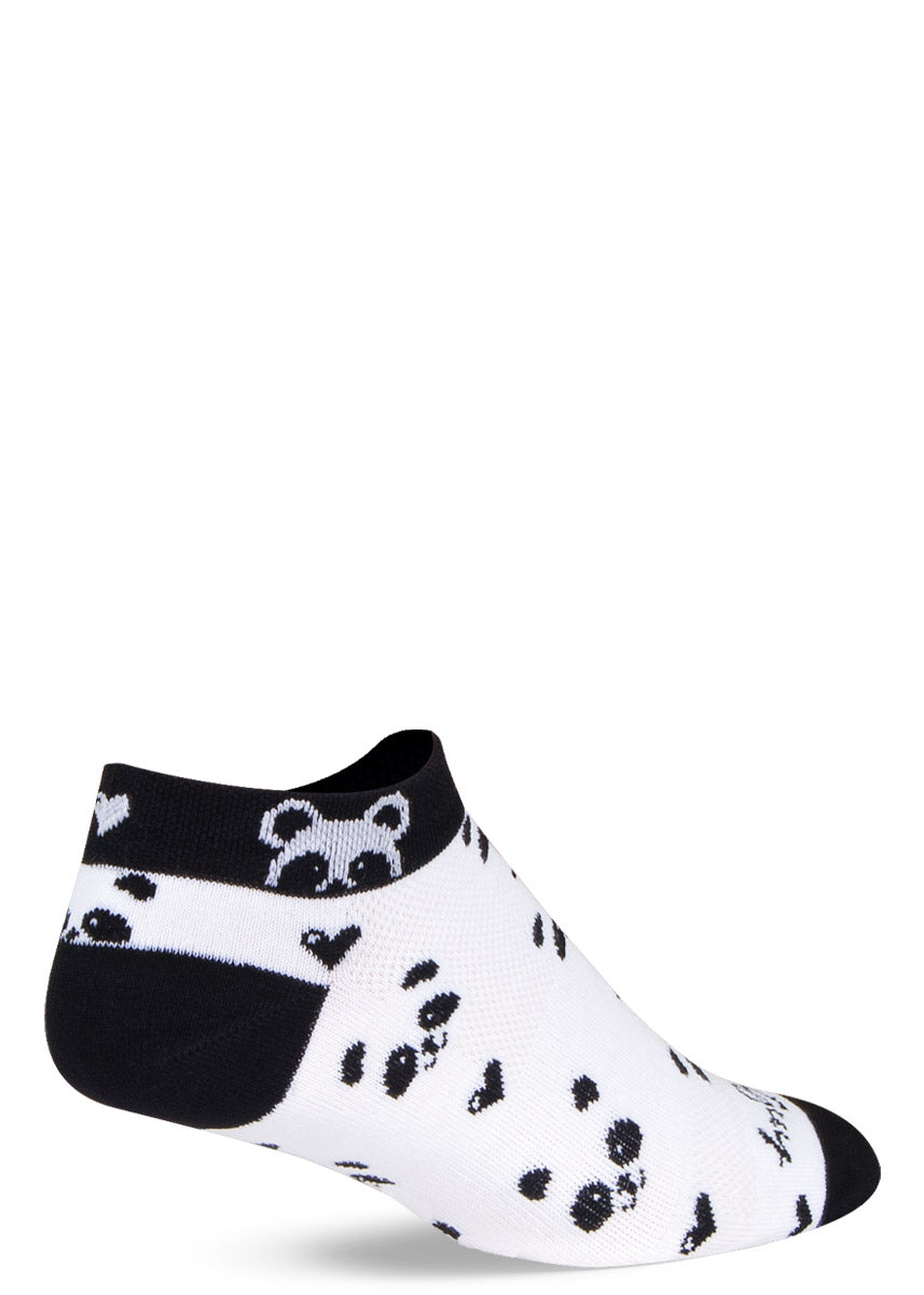 White athletic ankle socks for women with a black cuff, heel and toe as well as an allover pattern of smiling panda faces and hearts.