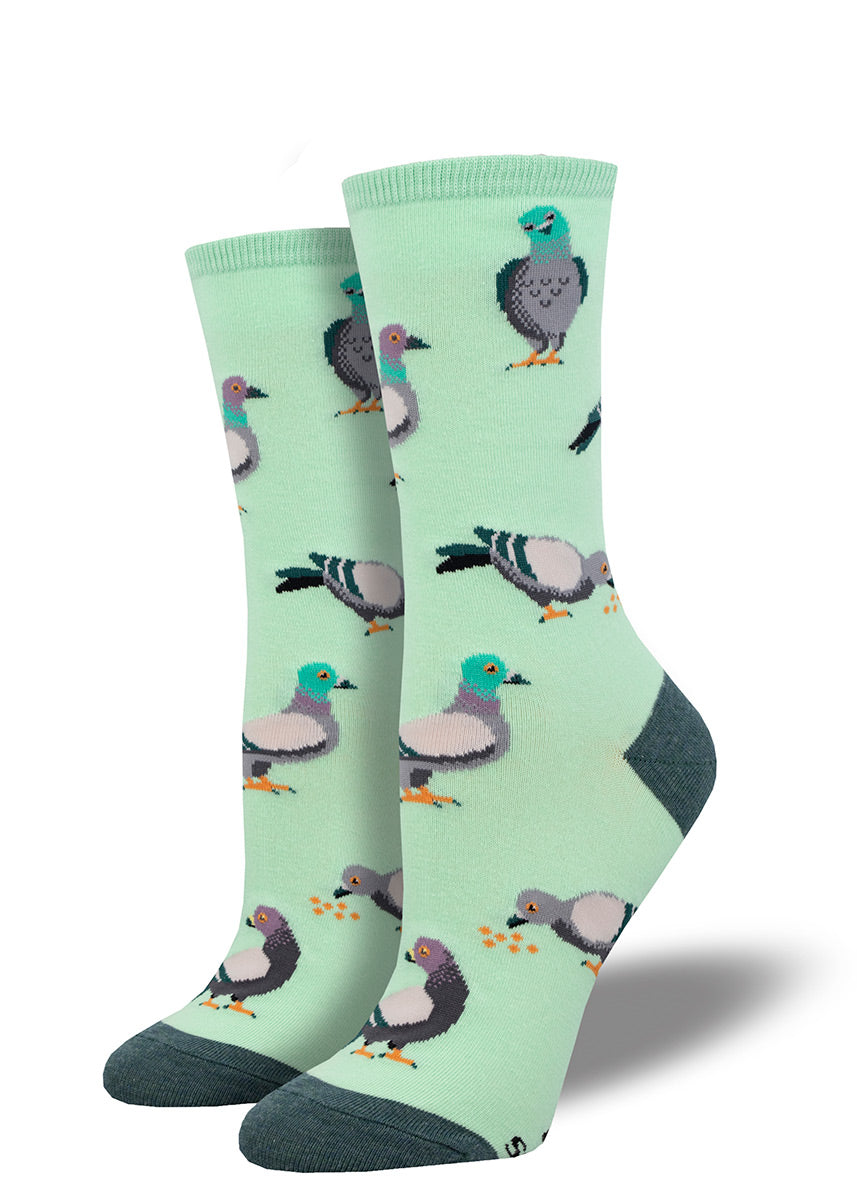 Mint green women's crew socks with an allover pattern of various pigeons.