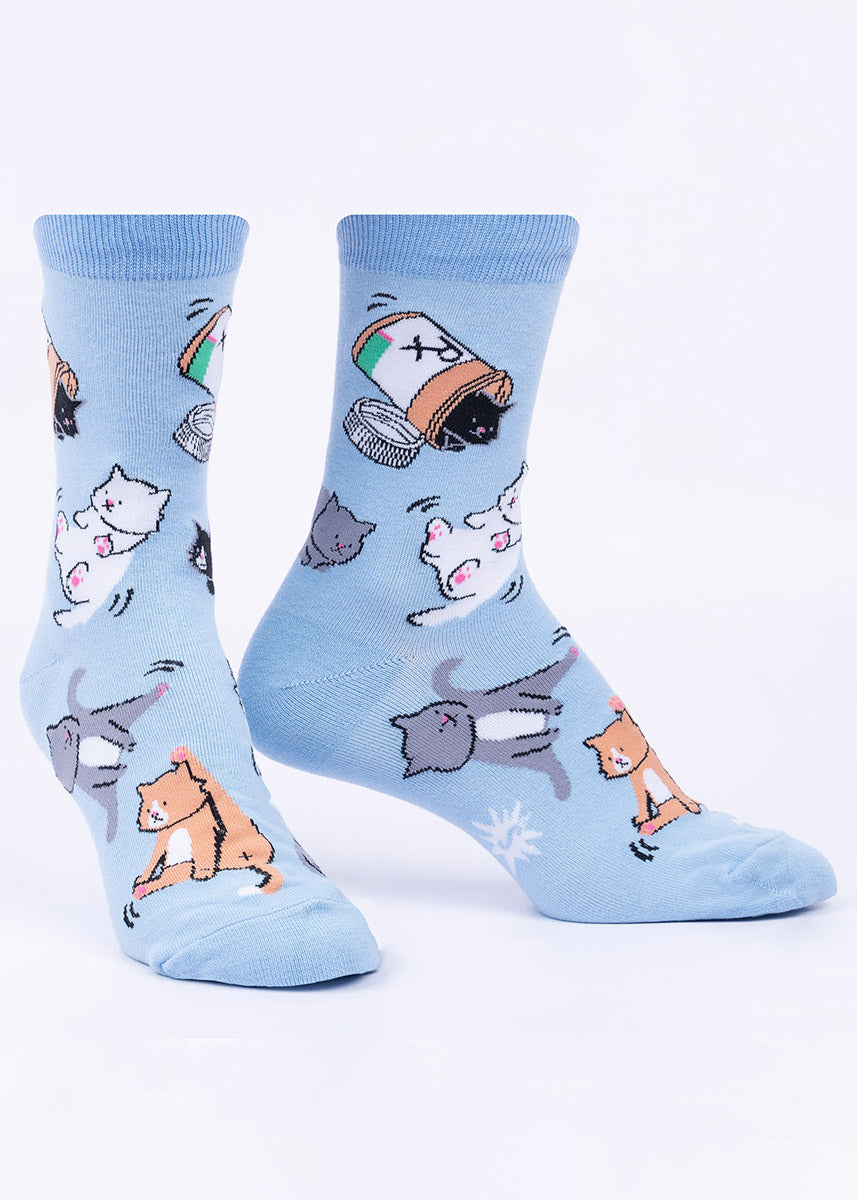 Women's crew socks with various cats spilling out of prescription bottles over a light blue background.